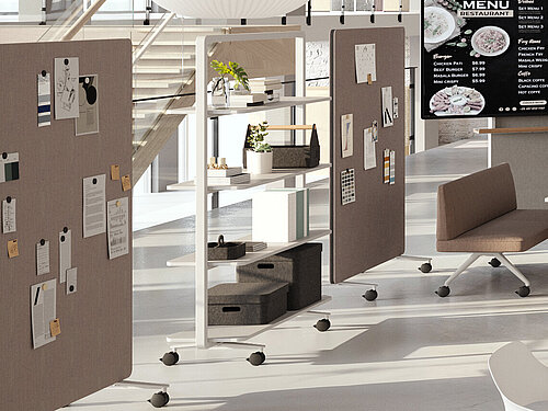 Confair Next elements in a bright café-style workspace with collaborative seating and mobile boards