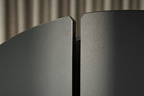 Confair Next panel detail, close-up of dark textured edge