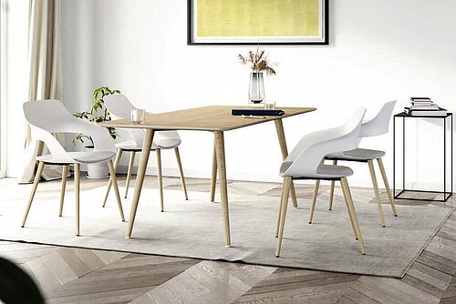 Occo chairs around dining table in bright interior