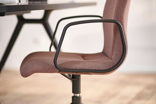 decide office chair in conference room, side view