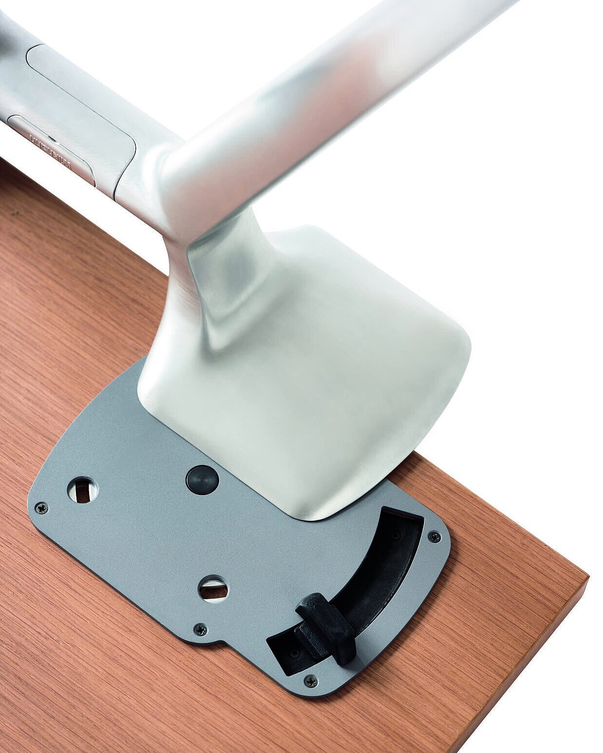 This is a close-up of the Versa tabletop with the table leg. The photo shows the holder that secures the table leg to the tabletop.
