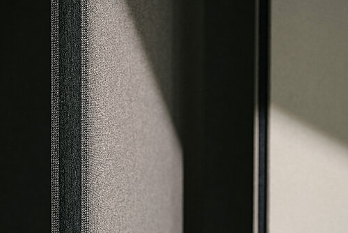 Confair Next, detail of fabric panel edge with felt trim