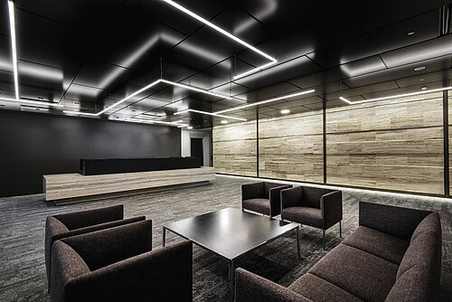 Asienta chairs in modern reception area with central coffee table