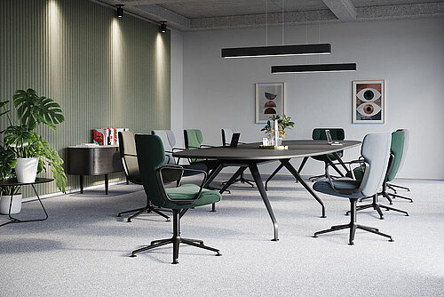 The modern meeting room is furnished with several Wilkhahn Intra conference chairs, shown here in dark green and gray. The chairs combine comfort with elegant, sleek lines and blend harmoniously into the high-quality interior. The large conference table with its striking base completes the professional atmosphere of the room. 
