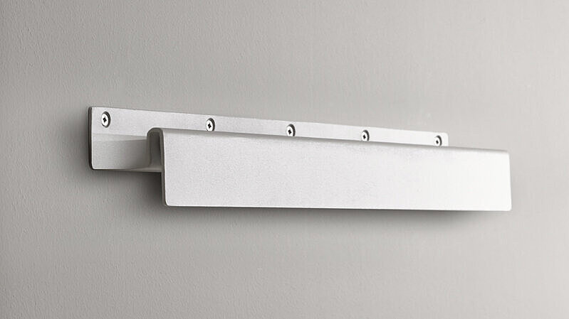A picture of a white wall shelf.