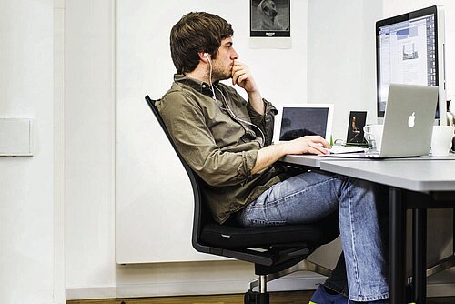 Neos chair at desk in modern office workspace