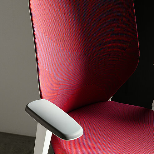 IN-Swivel-Chair, cut-out, close-up view of upholstered backrest, red fabric