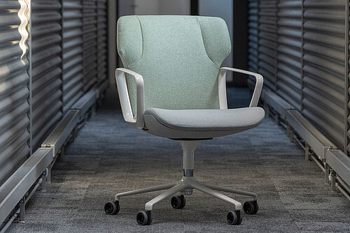 Intra office chair in corridor setting, single seating scene