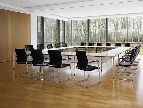 contas sito conference tables in meeting room, U-shaped setup with chairs