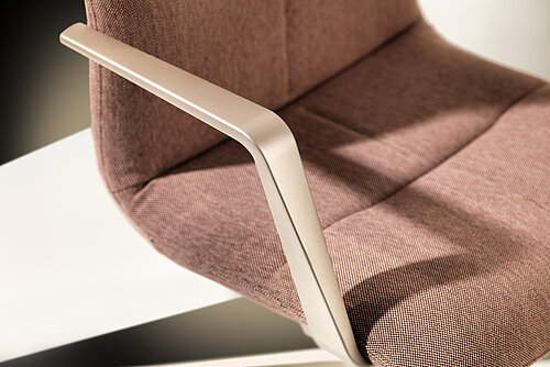 Decide silk office chairs in studio setting, product presentation scene