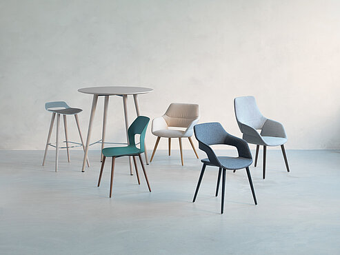 Occo chairs with table in studio environment, mixed materials and colors