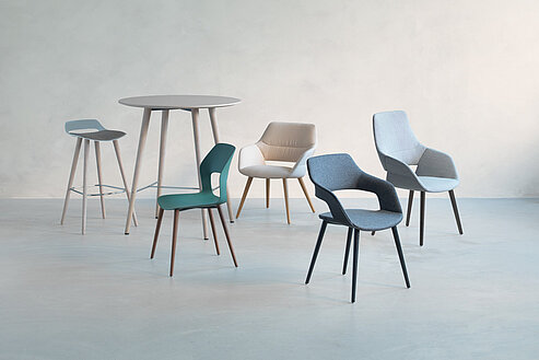 Occo chairs with table in studio environment, mixed materials and colors