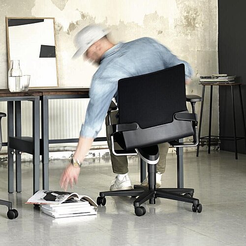 Person at desk showing the functionality of Trimension.