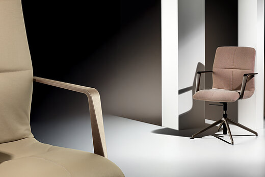 Decide office chairs in studio setting, product presentation scene