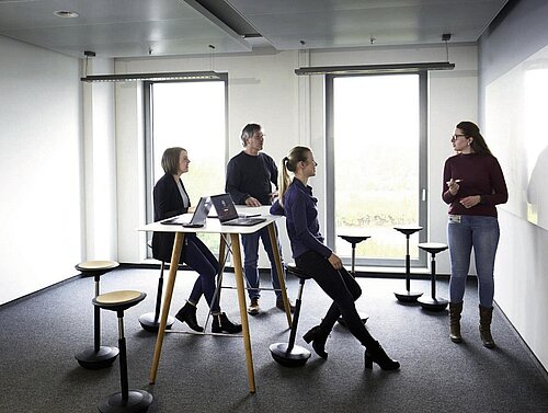 Stitz stools in collaborative meeting room, standing discussion setting