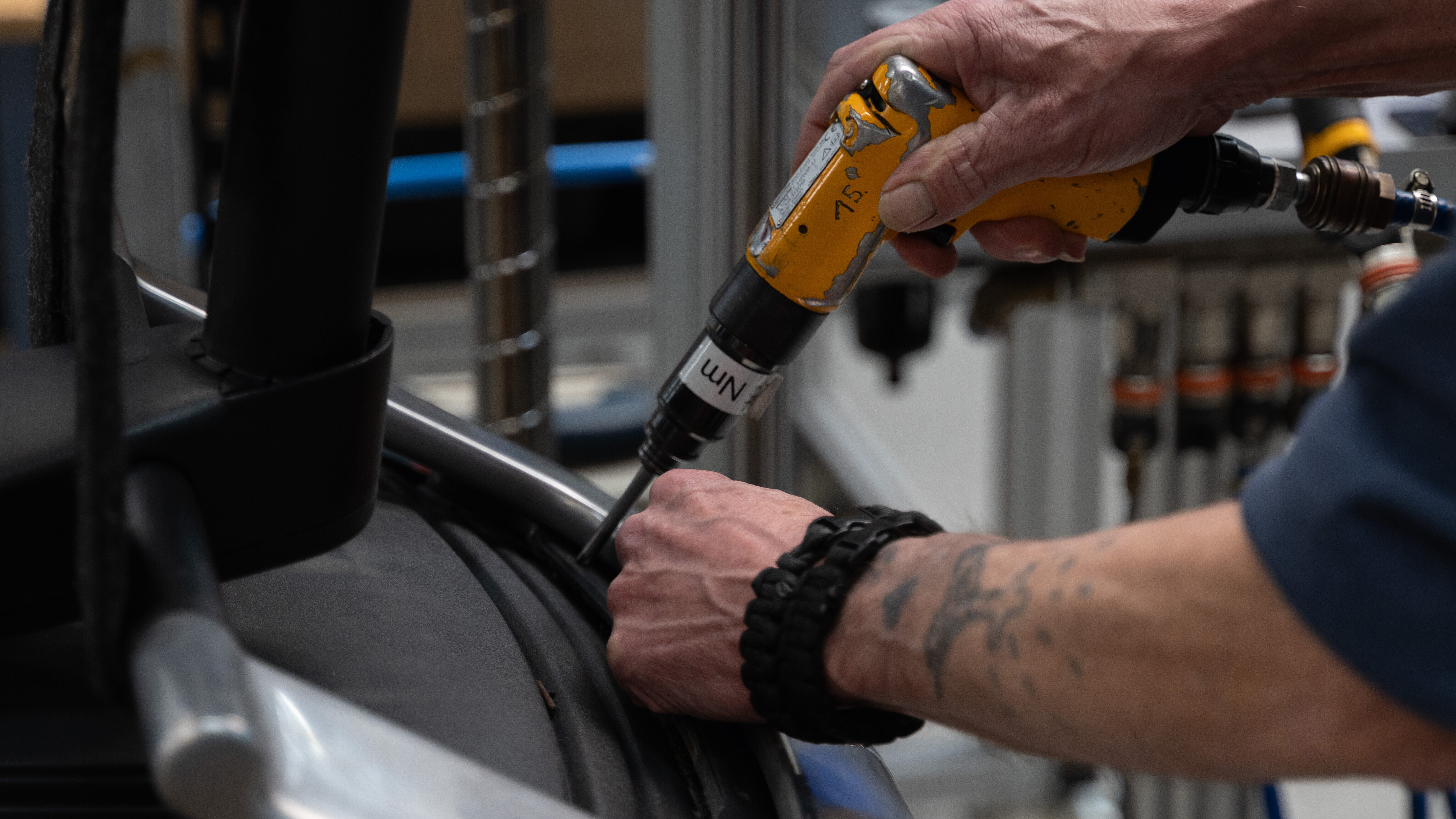 A close-up of someone installing a chair.