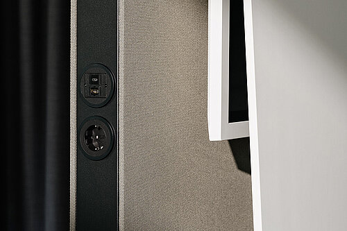 Confair Next Mediawall with integrated power and USB ports, detail view