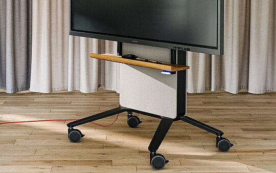 Confair Next mediawall with large display on wheels in workspace