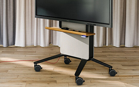 Confair Next mediawall with large display on wheels in workspace
