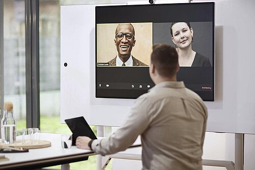Timetable lift table in meeting room, video conference setup
