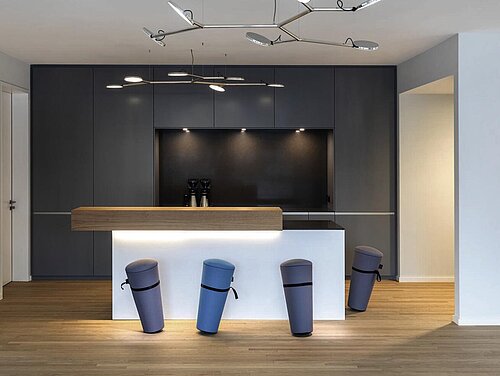 Stand-up stool at modern kitchen counter