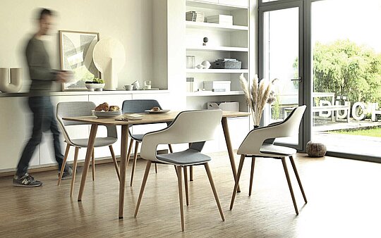 Occo chairs around dining table in bright interior