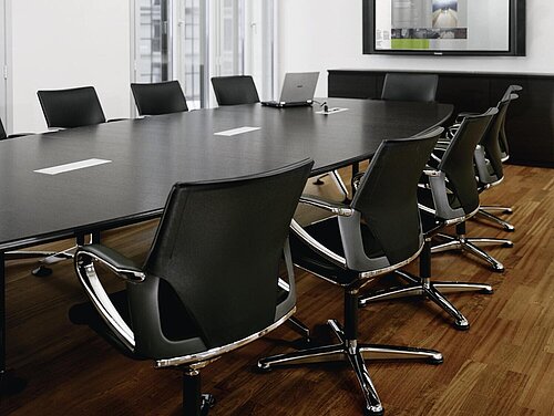 Logon table in boardroom, formal meeting environment