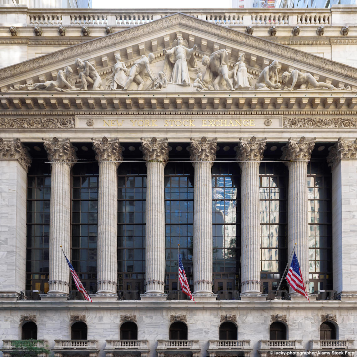 An exterior view of the Wall Street building. Six columns and decorative elements can be seen on the facade.