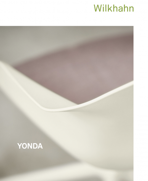A Close-up of the white Yonda seat shell and the pink seat cover.