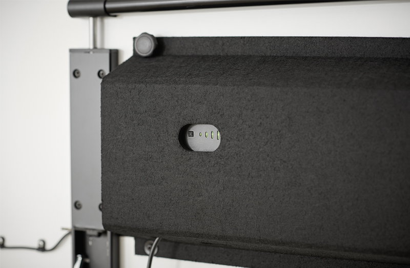 A black felt cover to conceal and house the technical components of the timetable.