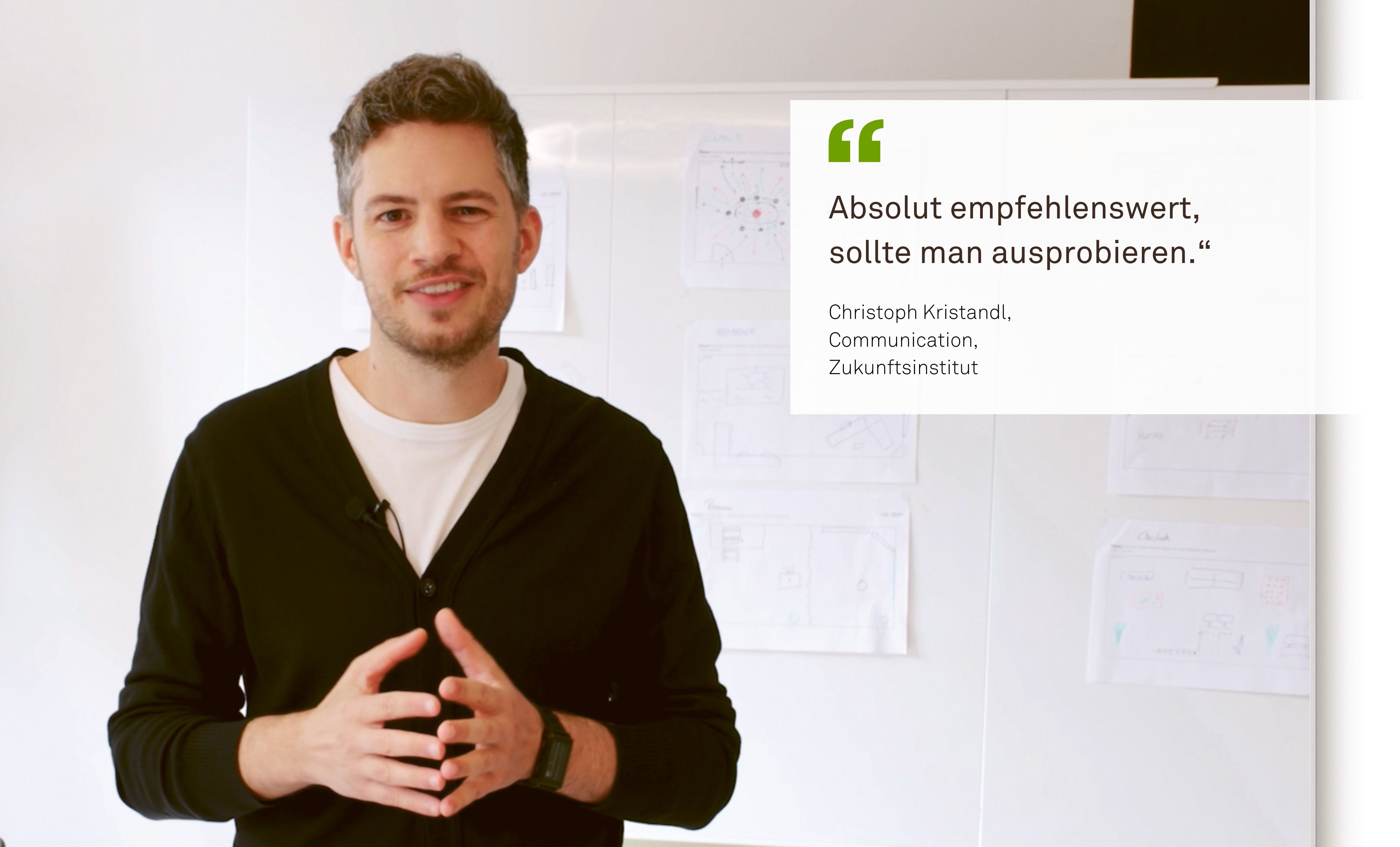 A man named Christoph Kristandl is standing in front of a whiteboard at the Zukunftsinstitut. Next to him is a quote that reads, “Highly recommended—you should give it a try.”