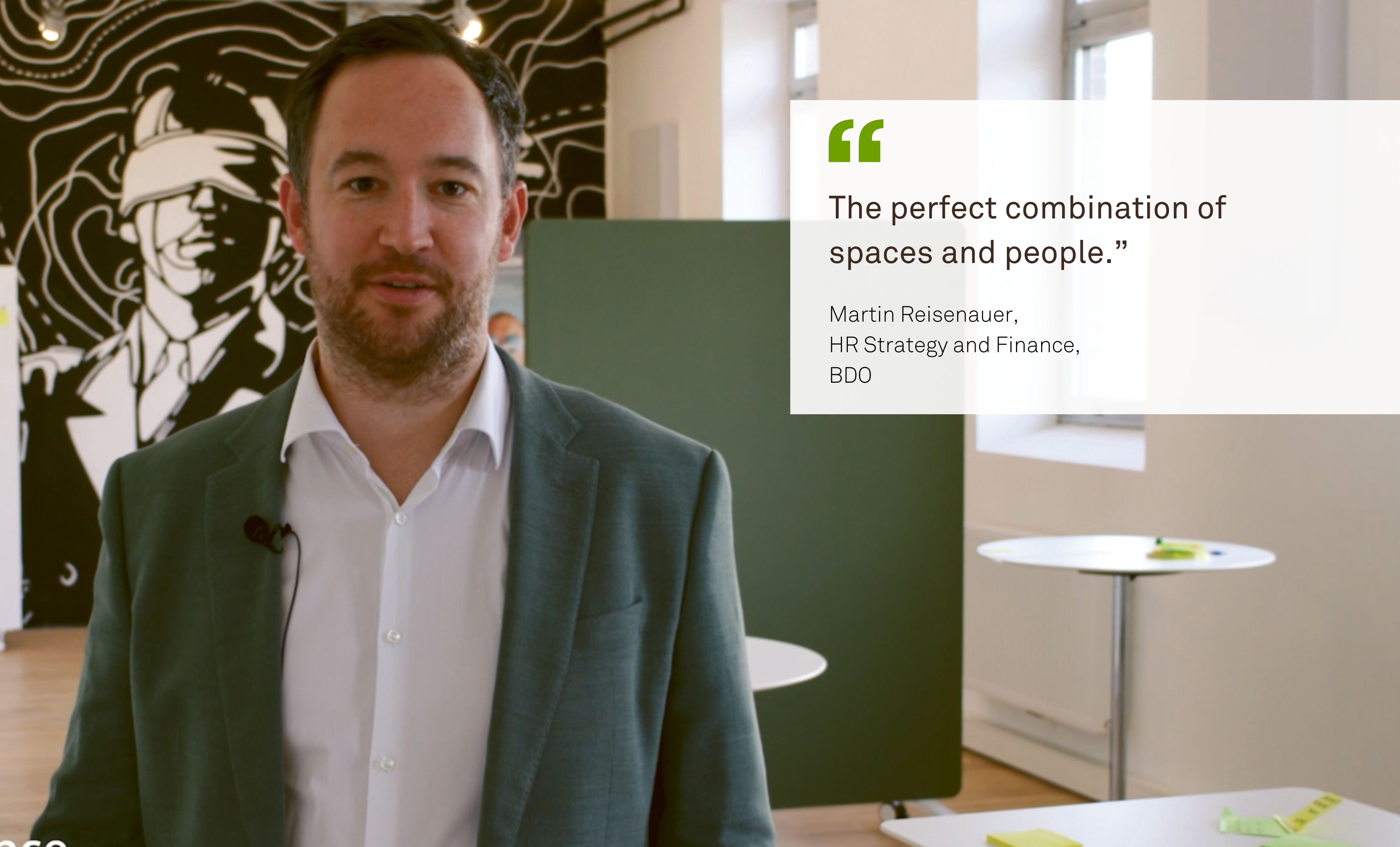 A man named Martin Reisenauer from BDO is standing in a room with a black-and-white wall in the background. Next to him is his quote: “The perfect combination of spaces and people.”