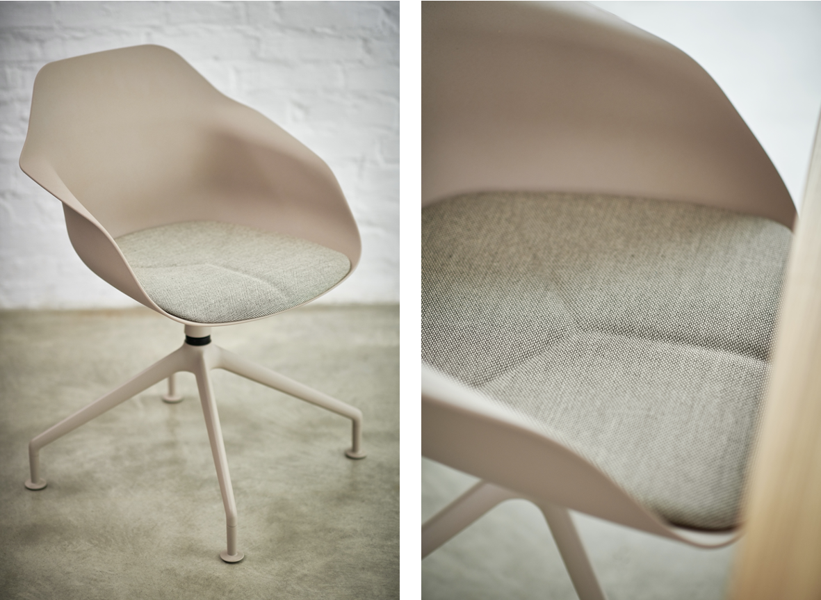 The photo shows a Yonda chair in a warm sand color, complemented by a softly padded seat cushion. The close-up highlights the high-quality fabric texture and the ergonomically shaped seat shell. The delicate four-star base underscores the chair’s light, modern design.