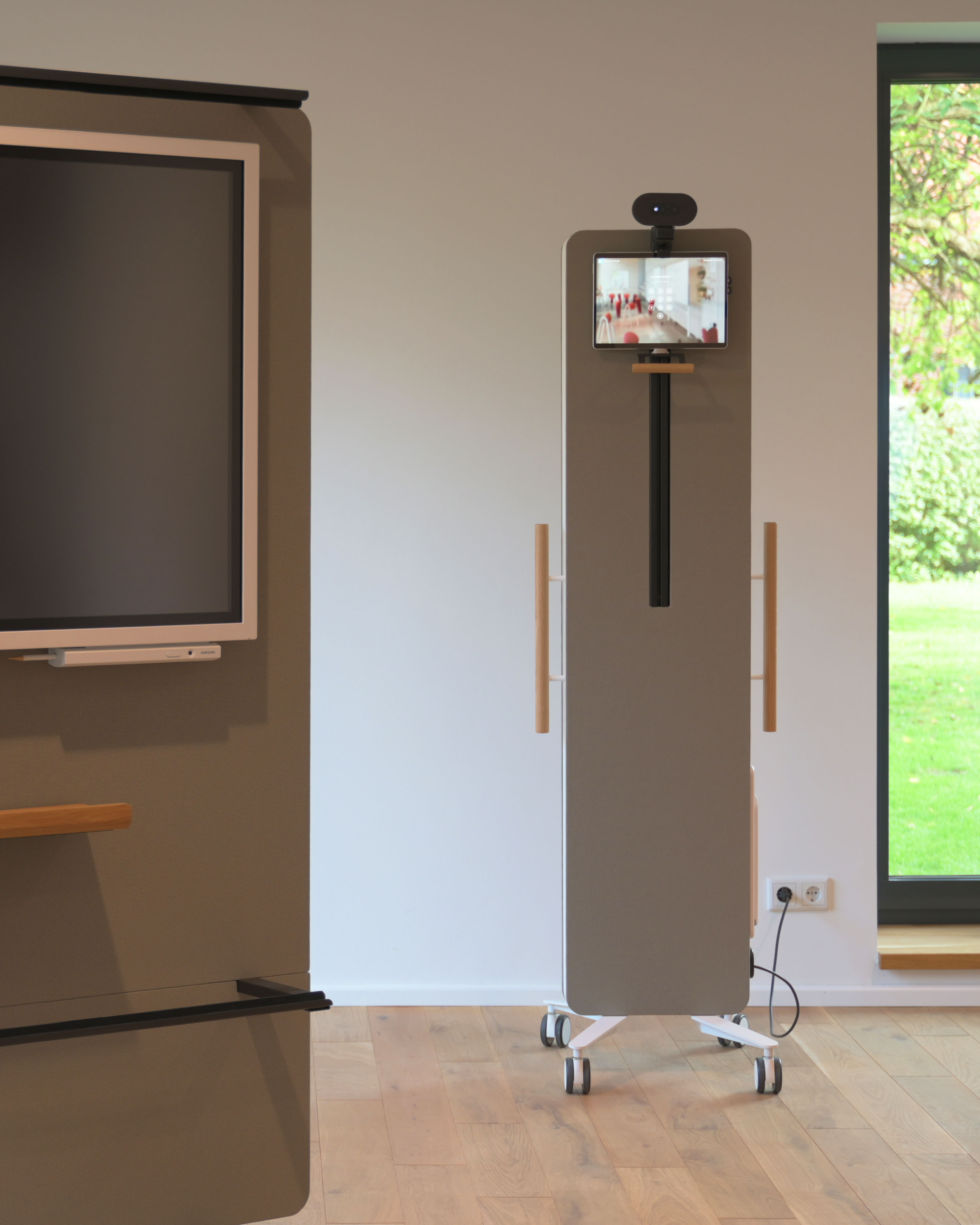 It is a close-up of two display racks. One is only partially visible, while the other is visible in its entirety. Both have a white frame and a beige back panel.