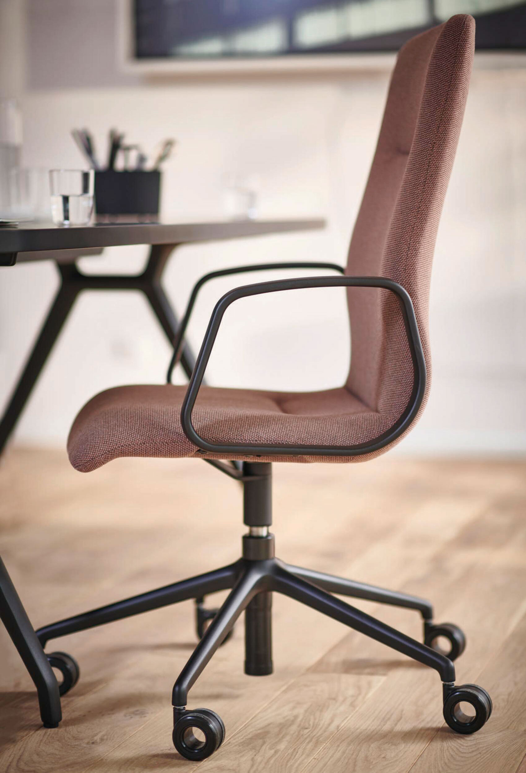 decide office chair in conference room, side view